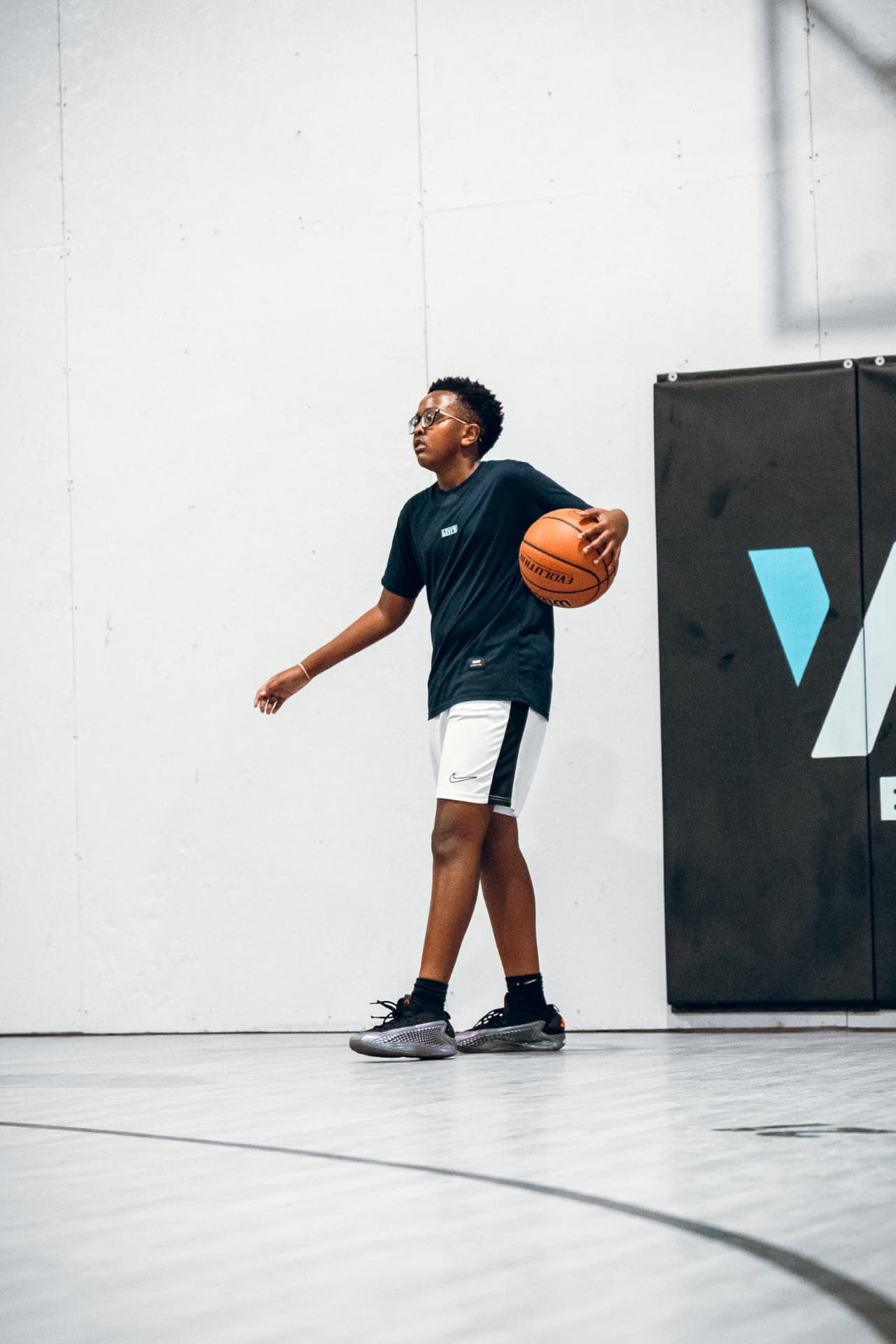 WIA basketball player holding a ball during training